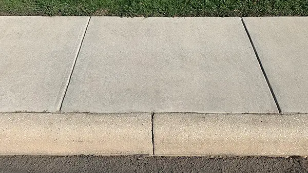 Sidewalk after pressure washing.