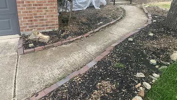 A walkway before pressure washing.