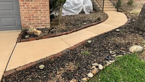 A walkway after pressure washing.