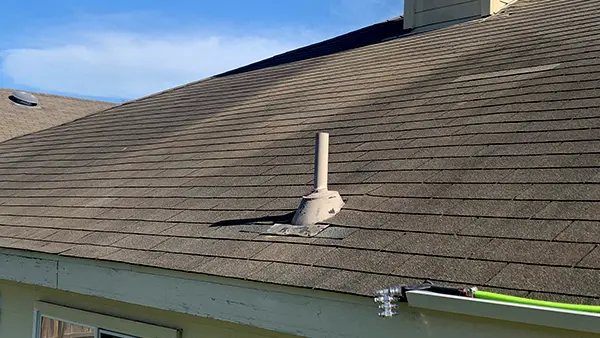 A shingle roof in San Antonio with dark algae staining