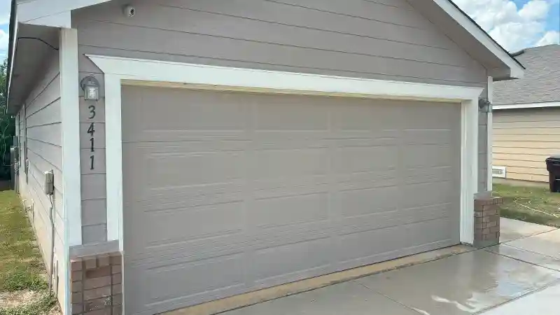 Oxidation removed from a garage door.