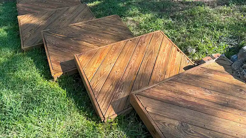 Wooden steps that have been sanded and stained.