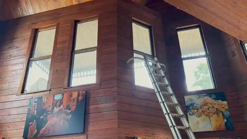 Dirty glass windows in a wooden house.