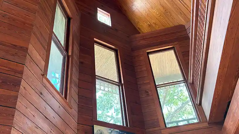 Clean glass windows in a wooden house.