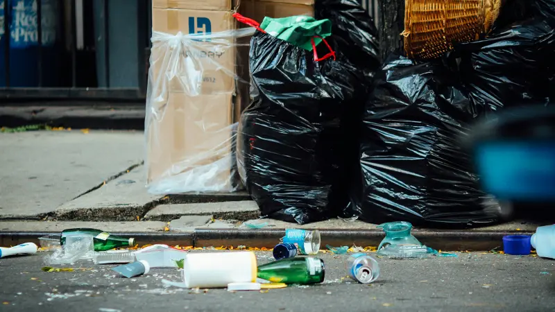 Trash on concrete.