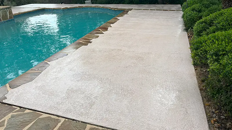 A clean white pool deck.