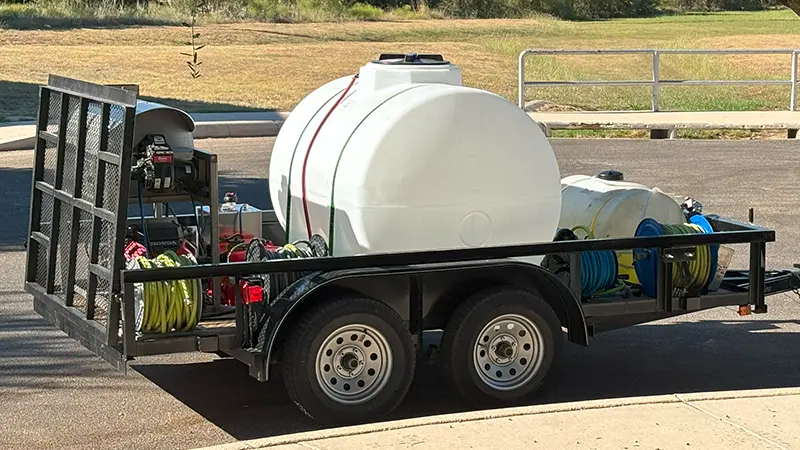 A pressure washing trailer.