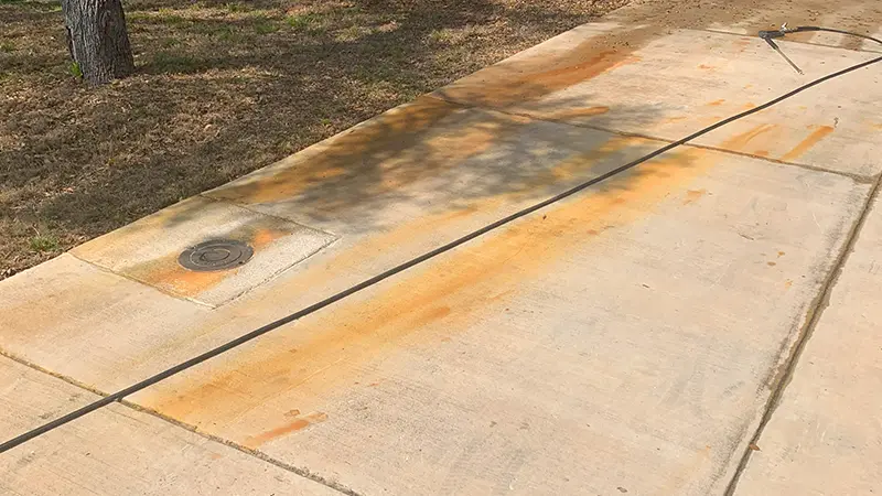 A driveway with rust stains.