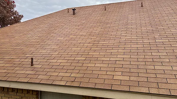A shingle roof that has been cleaned.