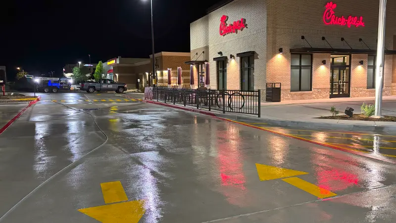 A Chick-fil-A parking lot that has been pressure washed in San Antonio.